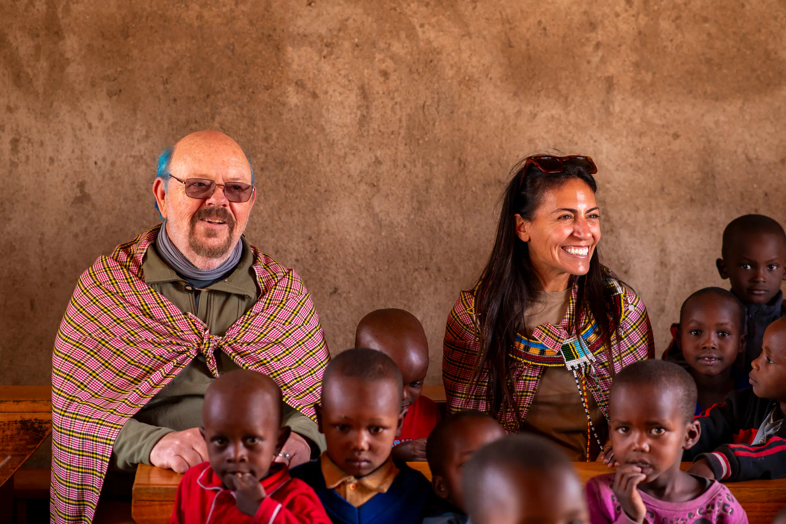 Visitors with children in a classroom